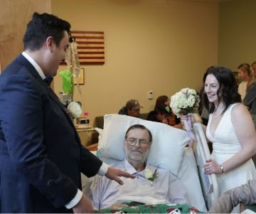 AJ Pieper and his wife Dani Finlay celebrate their wedding with loved ones.