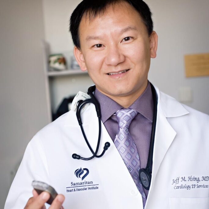 Jeff Hsing, MD in white coat with stethoscope