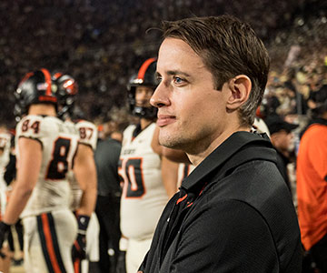 Dr. Christopher McCrum on the sidelines of an OSU football game.