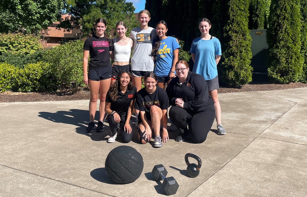 Participants in the Girl's Strength Camp posing for a group picture.