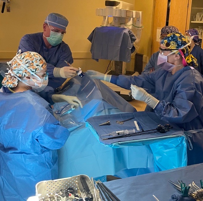Team performing surgery.