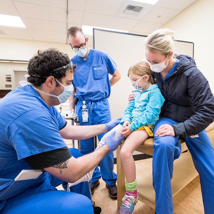 Surgery resident with child