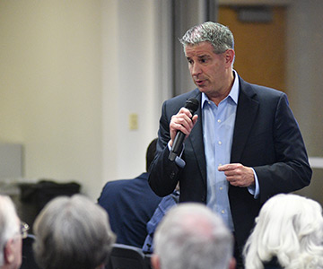 Samaritan CEO Marty Cahill takes question from the audience at a town hall.