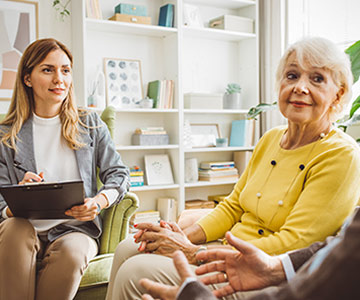 Senior woman consulting with a medical professional.