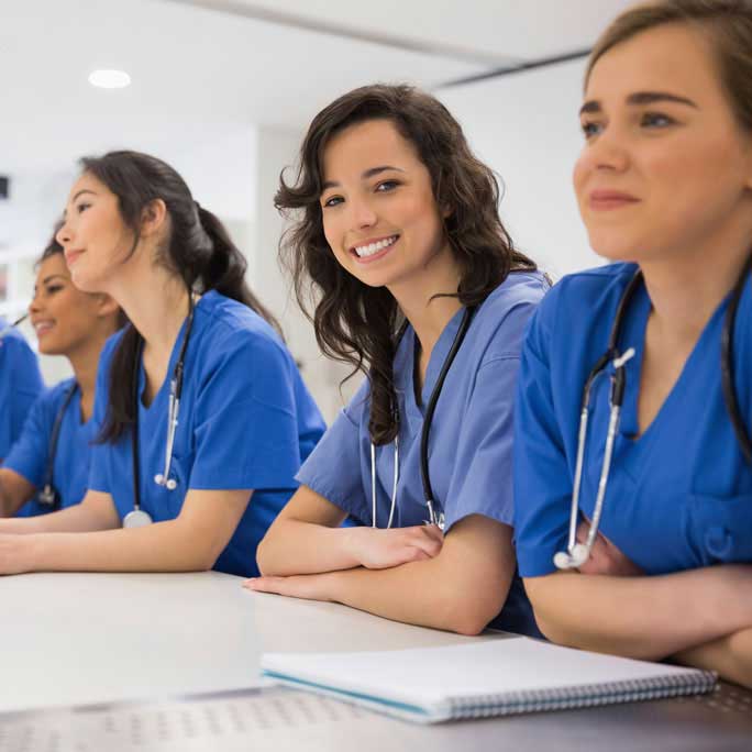 Medical students at classroom table