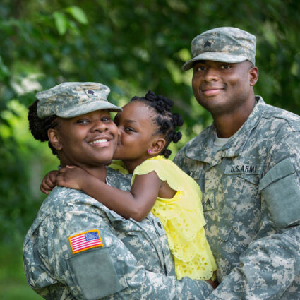 Military couple with their child