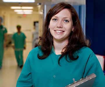 Labor and delivery nurse standing in her work unit