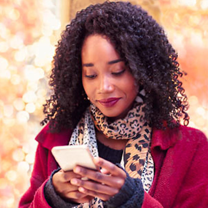 Person looking at cell phone.