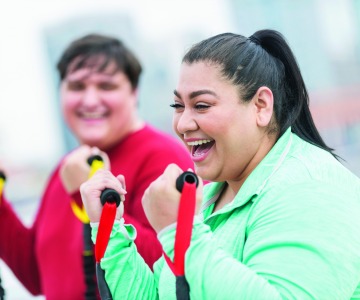 eople exercising with a positive attitude