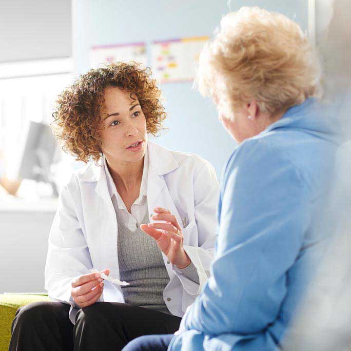 doctor talking to a patient