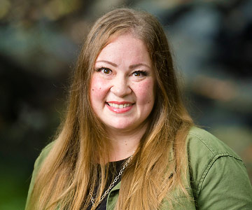 Close up of a smiling Ashley.
