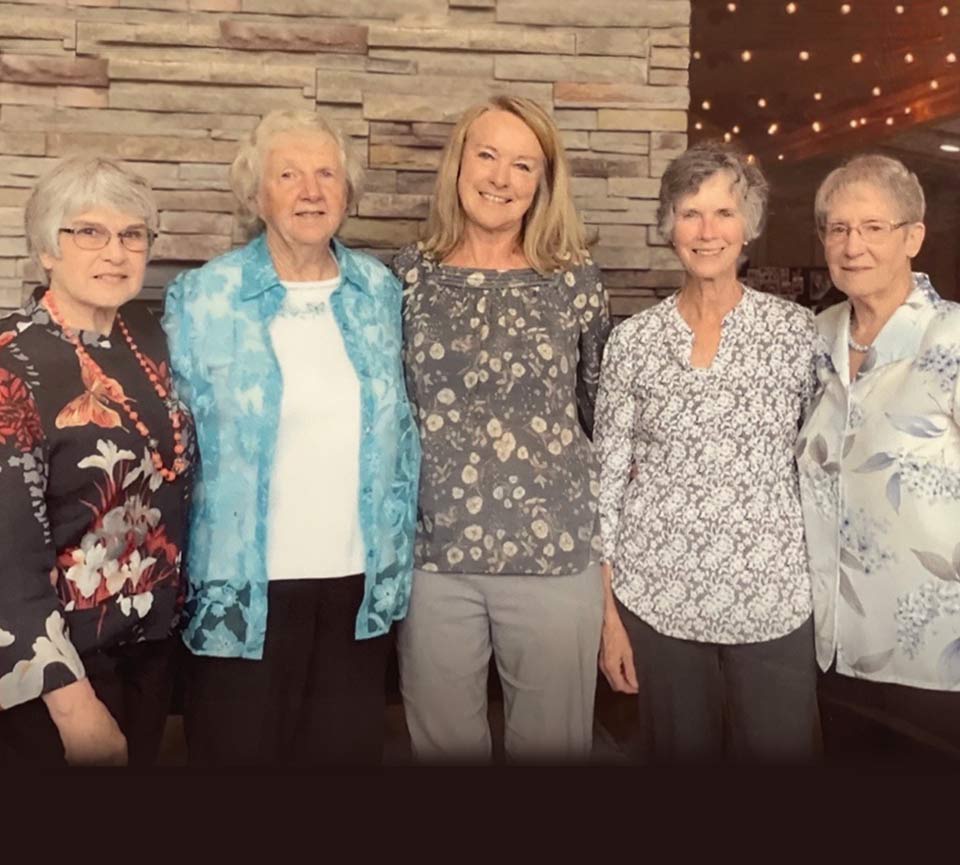 Carol with a group of close knit co-workers.