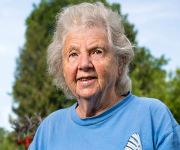 Carol out in her garden reflecting on her 37 years at Good Samaritan Regional Medical Center.