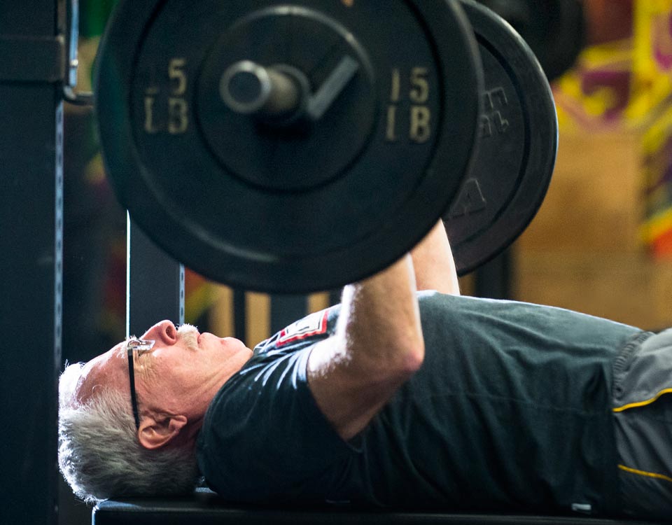 Gary bench pressing heavy weights.