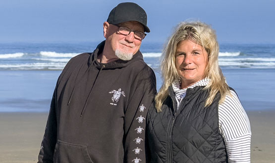 Jeanette and her husband on a sunny day at Nye beach in Newport.