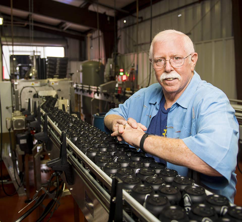 Jim next to the bottling line at Rogue Ales brewery in Newport.