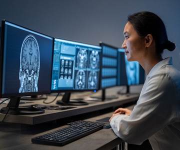 Radiologist reviews digital images