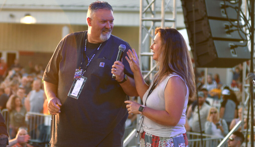 Scott and Angie on stage at the county fair.