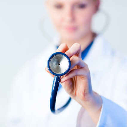 doctor holding stethoscope