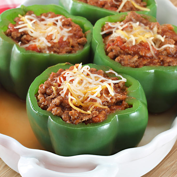Plate of stuffed green bell peppers.