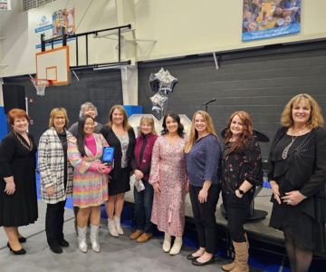 Staff gathered to celebrate winning the Sweet Home Chamber of Commerce Business of the Year Award.