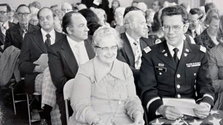 A black and white photo of Virginia Welch at the dedication of the new hospital.