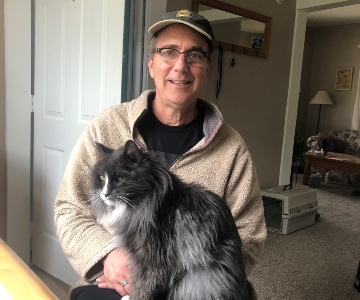 Kent Wiles with cat Barney.