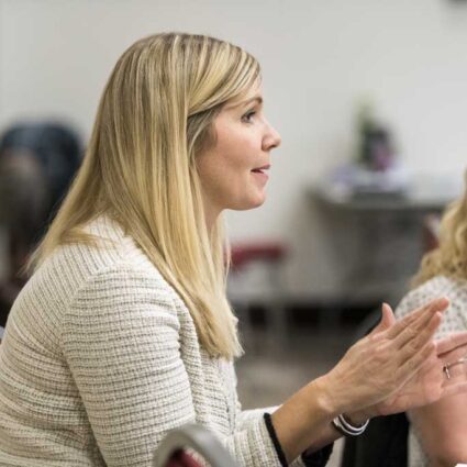 Local woman talking at a WISH event.